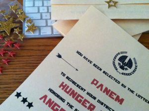 I saw an invitation online and I just made my own version of it using some clip art and a Hunger Games font.